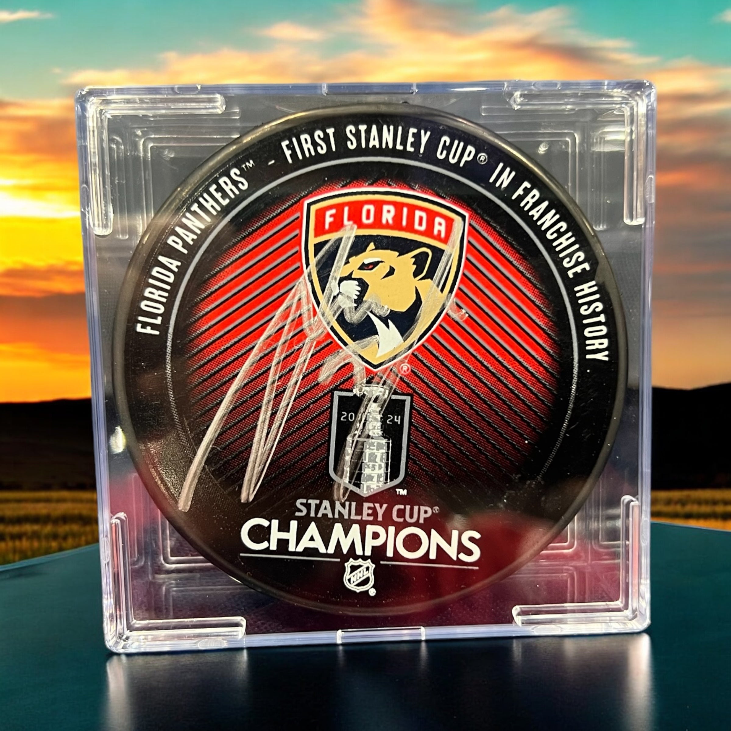 Florida Panthers Anton Lundell Autographed SC Champs Hockey Puck with JSA COA