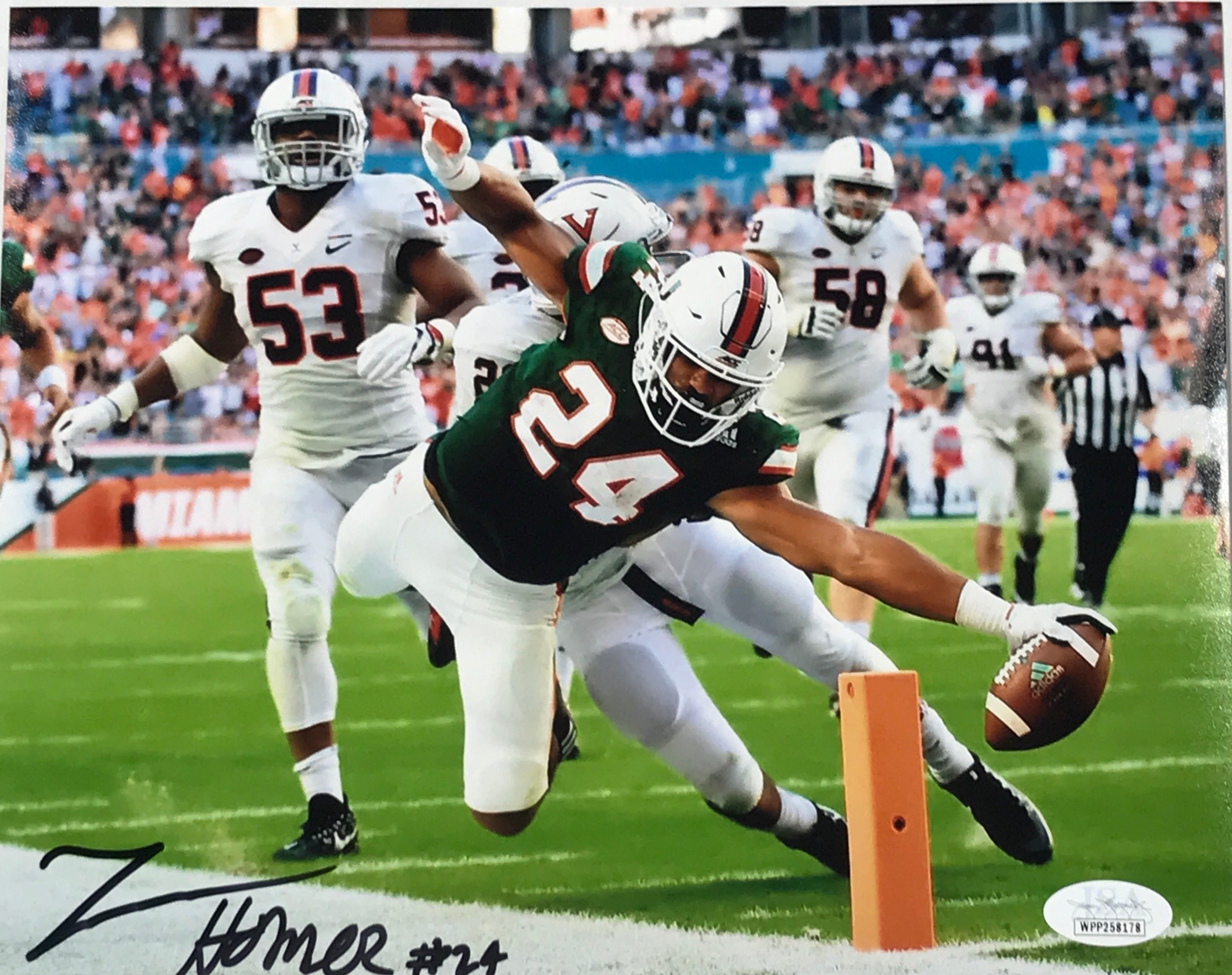 Autographed Travis Homer 8x10 Photo - TD