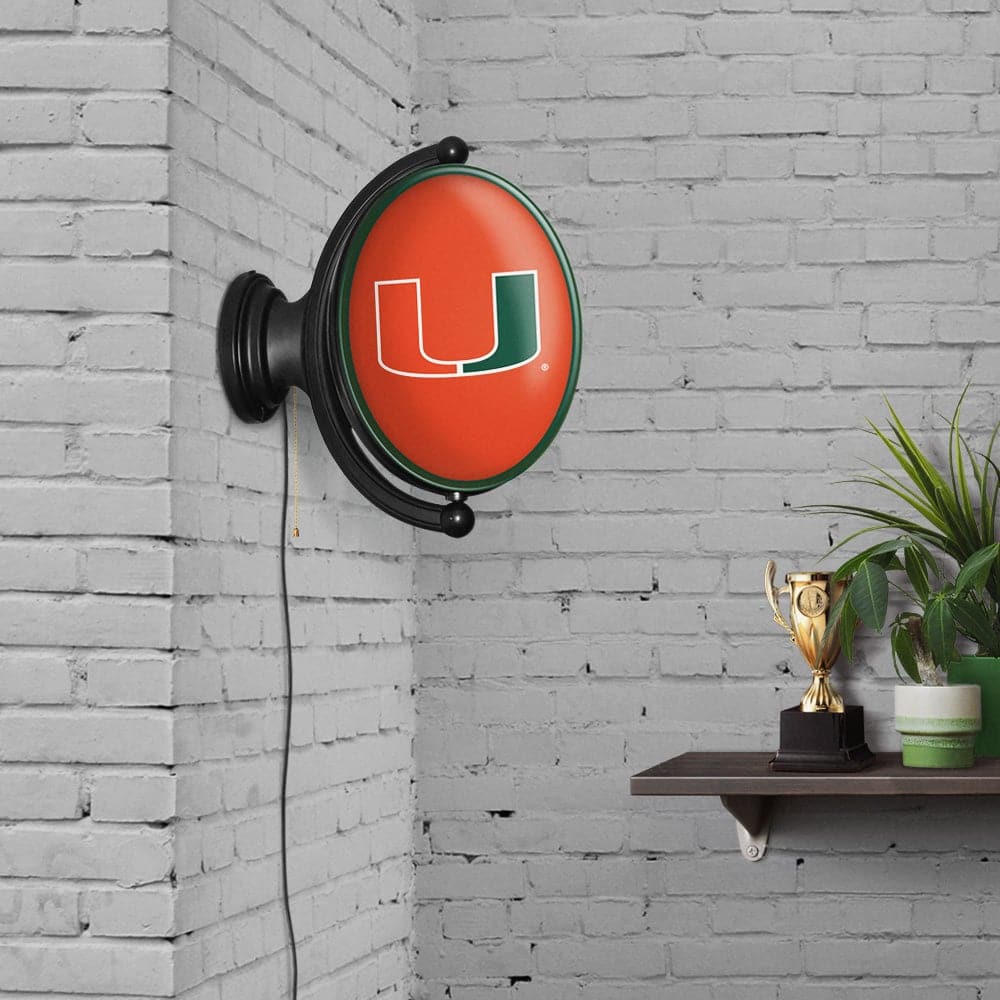 Miami Hurricanes Original Oval Rotating Lighted Wall Sign - The Fan-Brand