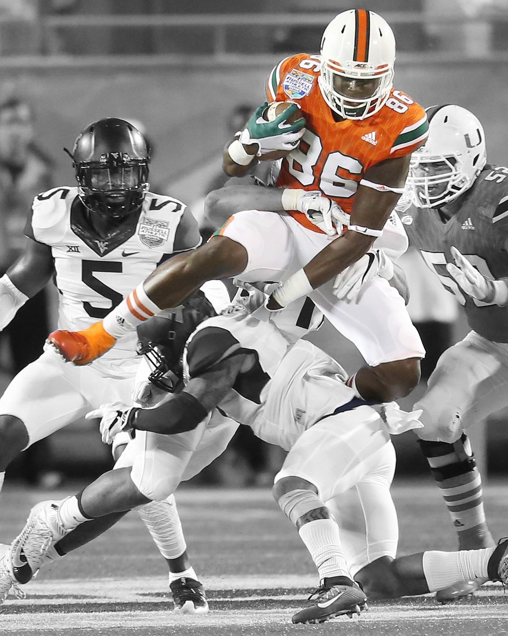 Autographed David Njoku Photo -  Leaping Defender