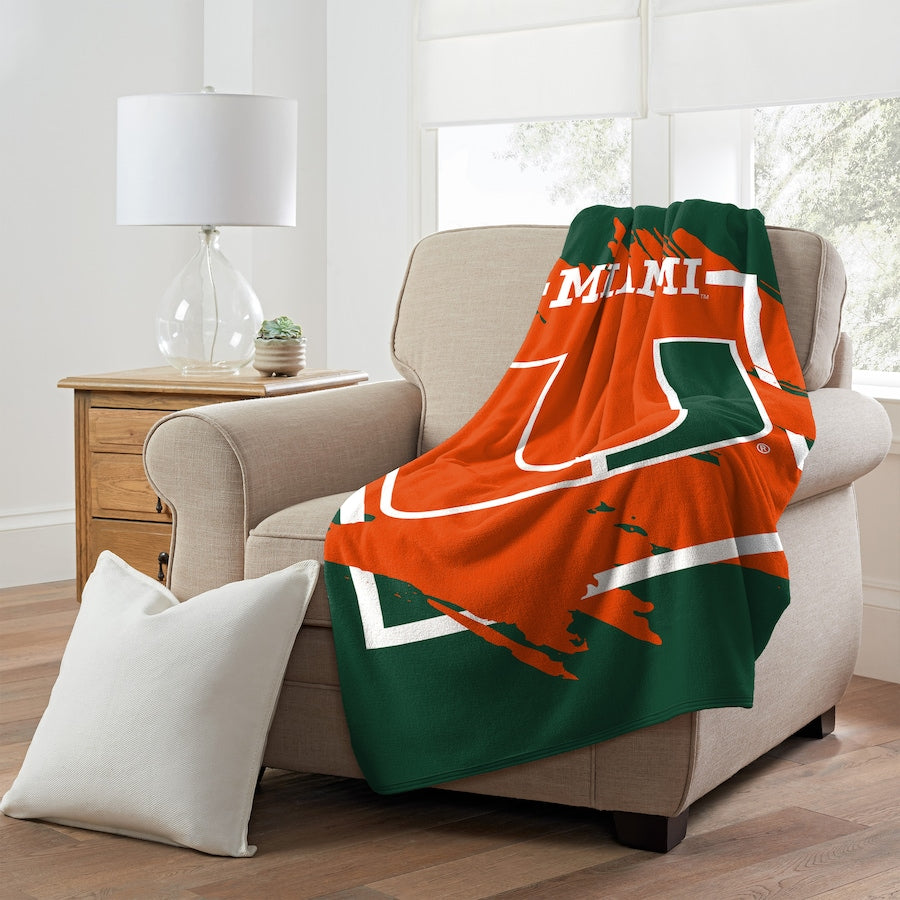 Logo Brands Miami Hurricanes Raschel Hunter 50-in x 60-in 2-lb Throw in Logo Brands Miami Hurricanes Raschel Hunter 50-in x 60-in 2-lb Throw in