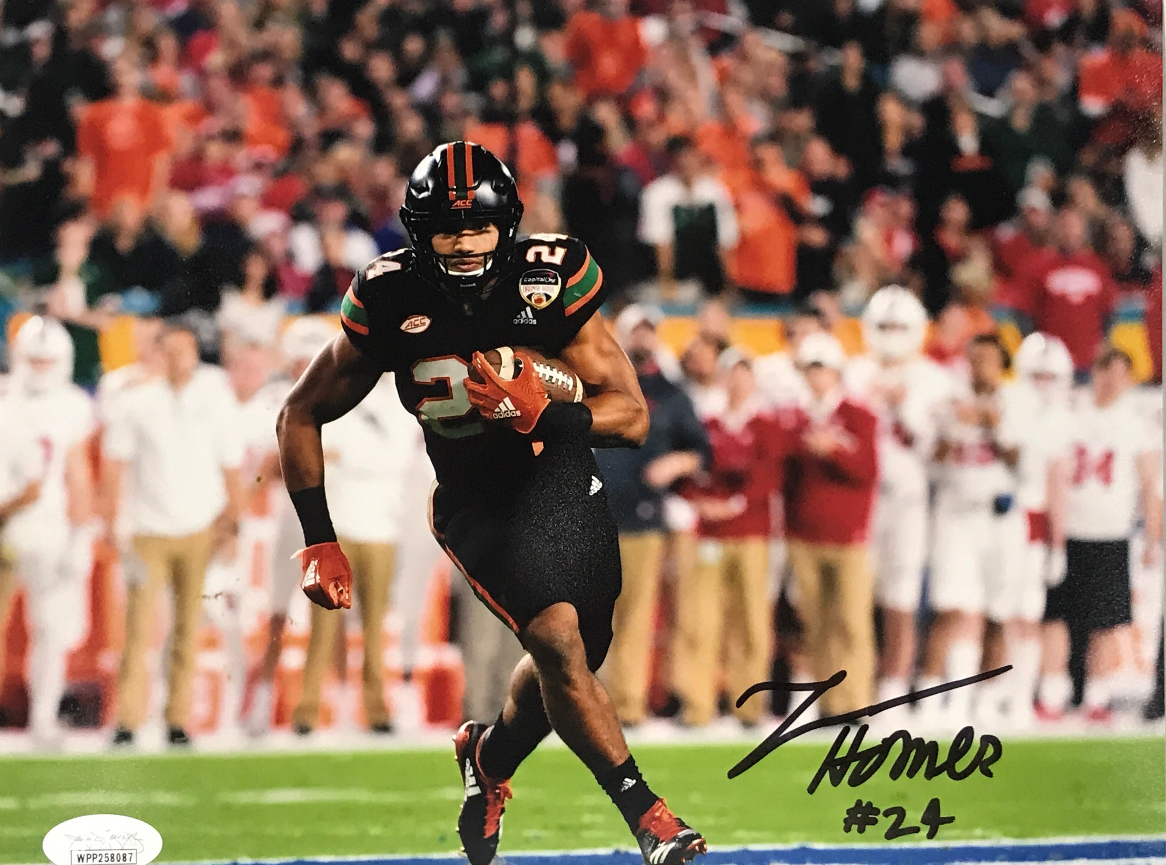 Autographed Travis Homer 8x10 Photo- Black Jersey